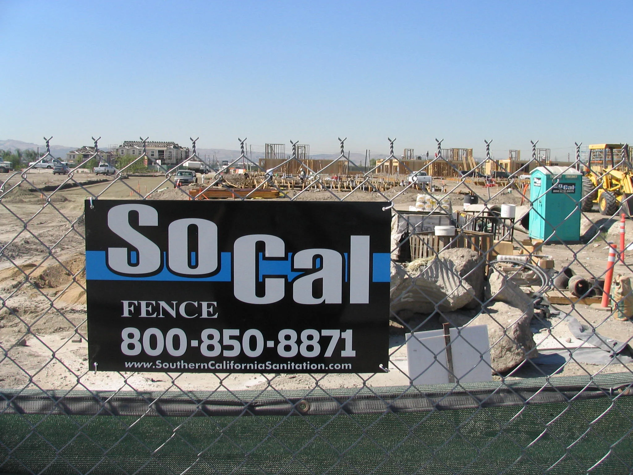 Temporary fence perimeter at a San Bernardino County logistics site